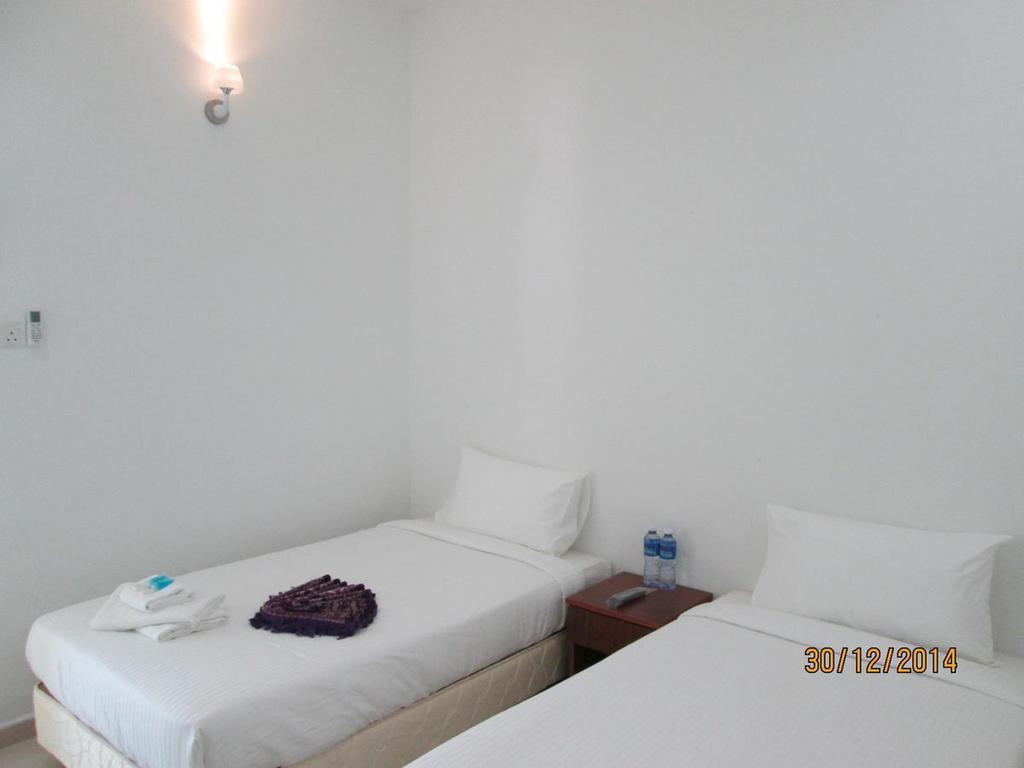פנתאי צנאנג Oyo 275 Senyum Inn מראה חיצוני תמונה