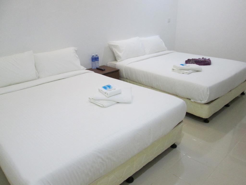 פנתאי צנאנג Oyo 275 Senyum Inn מראה חיצוני תמונה